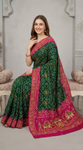Dark Green bandhej silk saree with embroidery work
