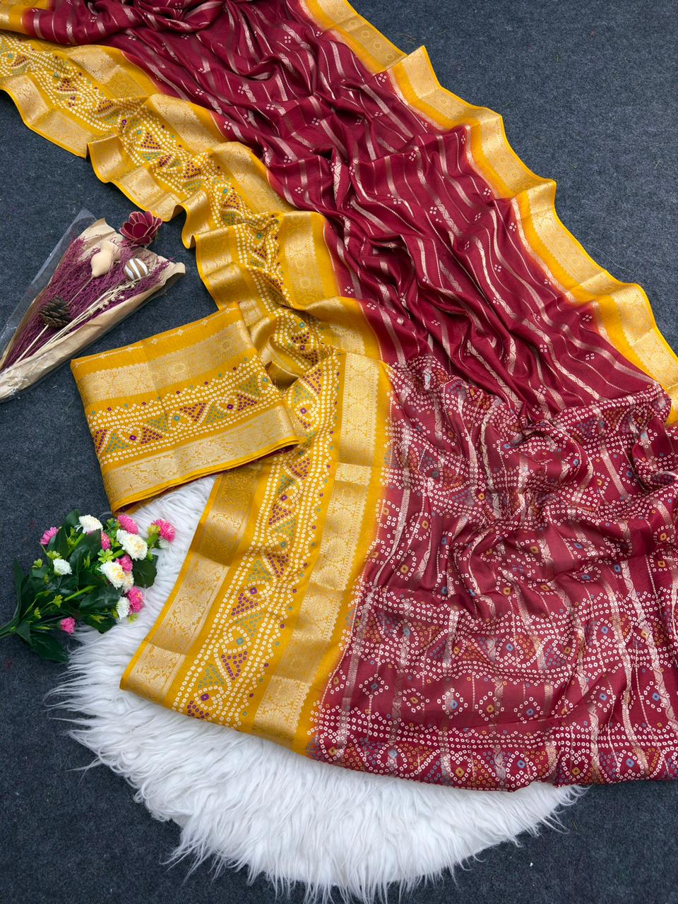 Red bandhani saree with dola jarvi jacquard work