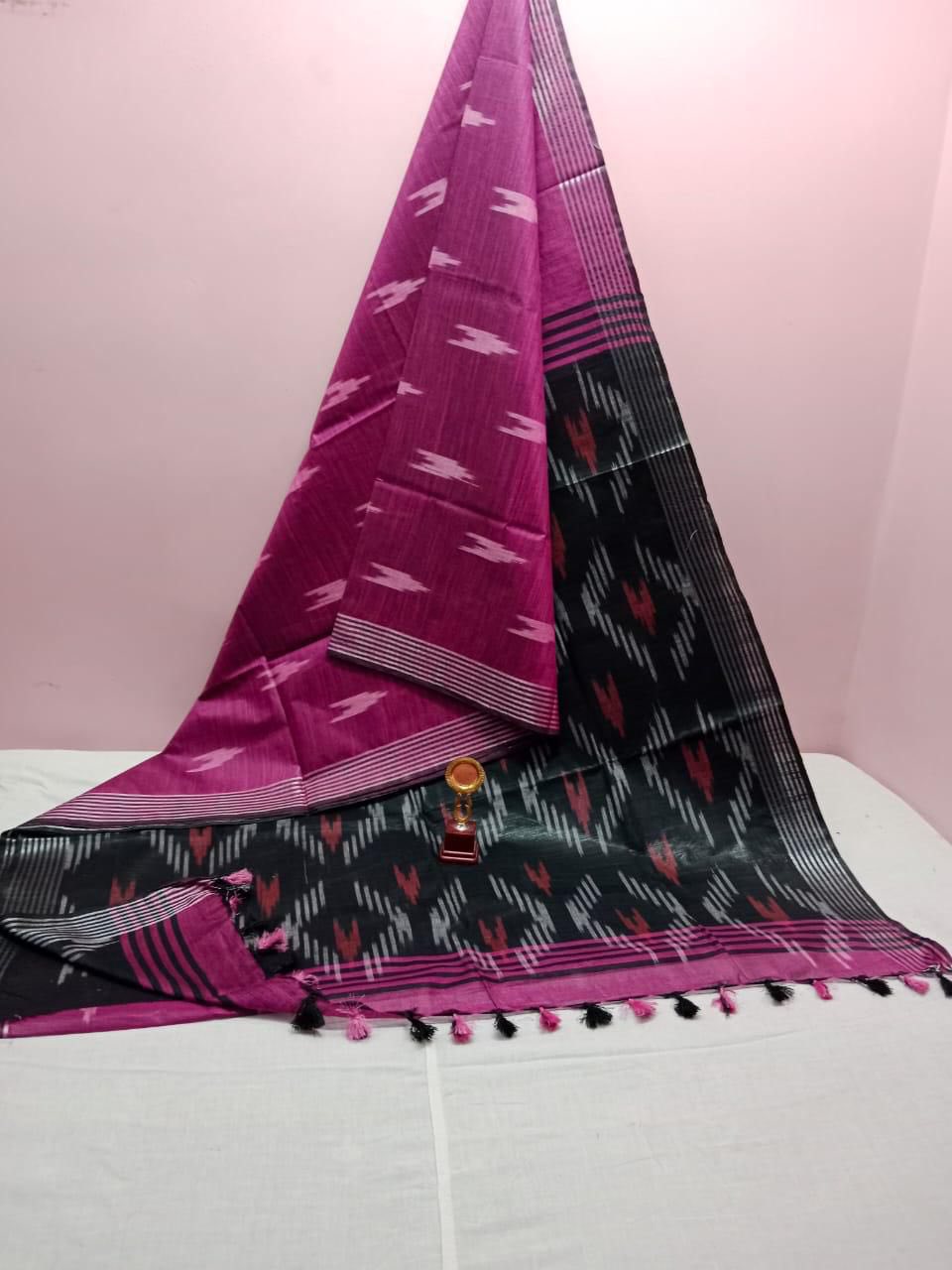 Ikkat pink with black pallu saree - Classic to Modern