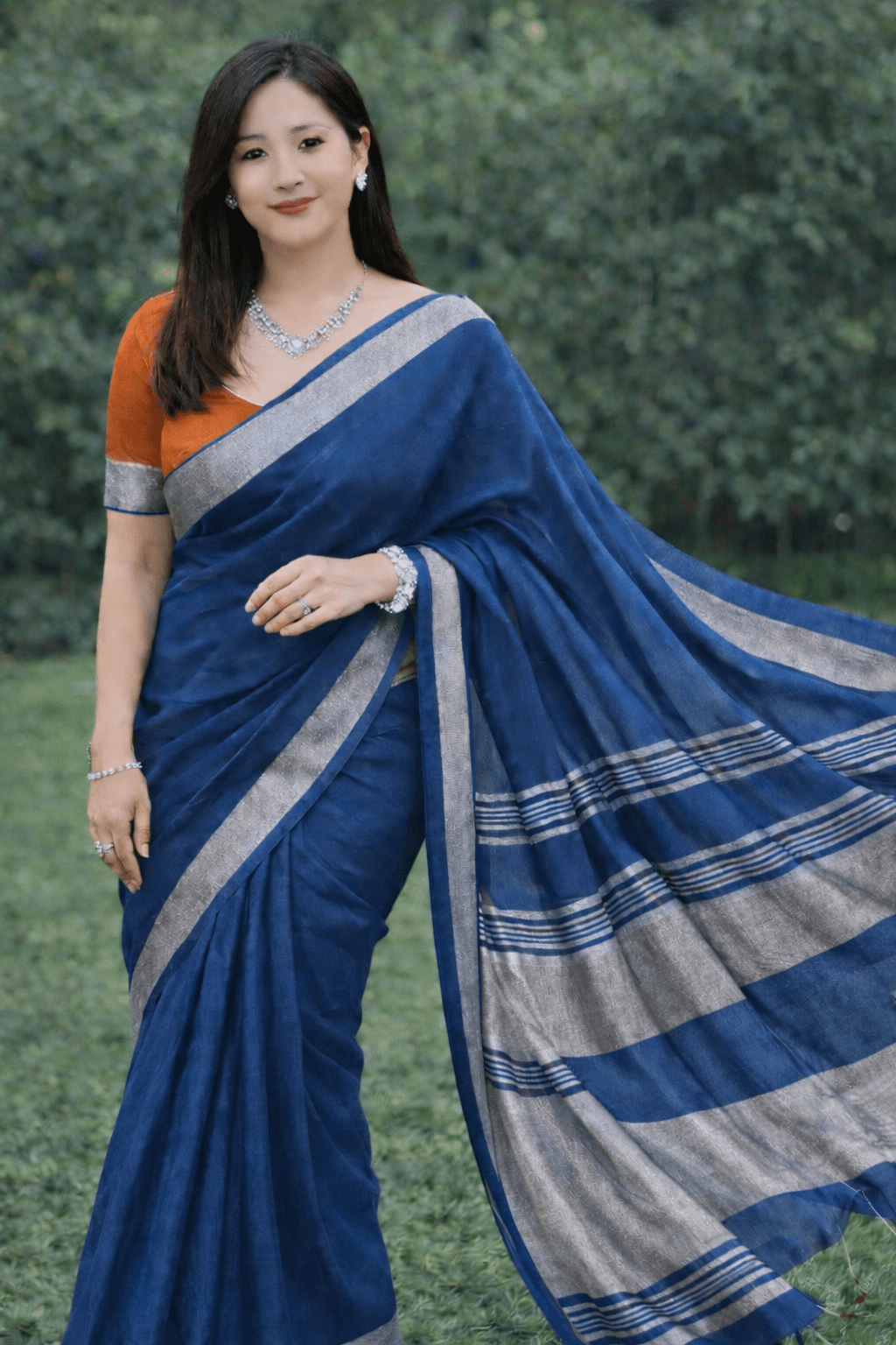 Linen Blue Saree with Orange Blouse - Classic to Modern