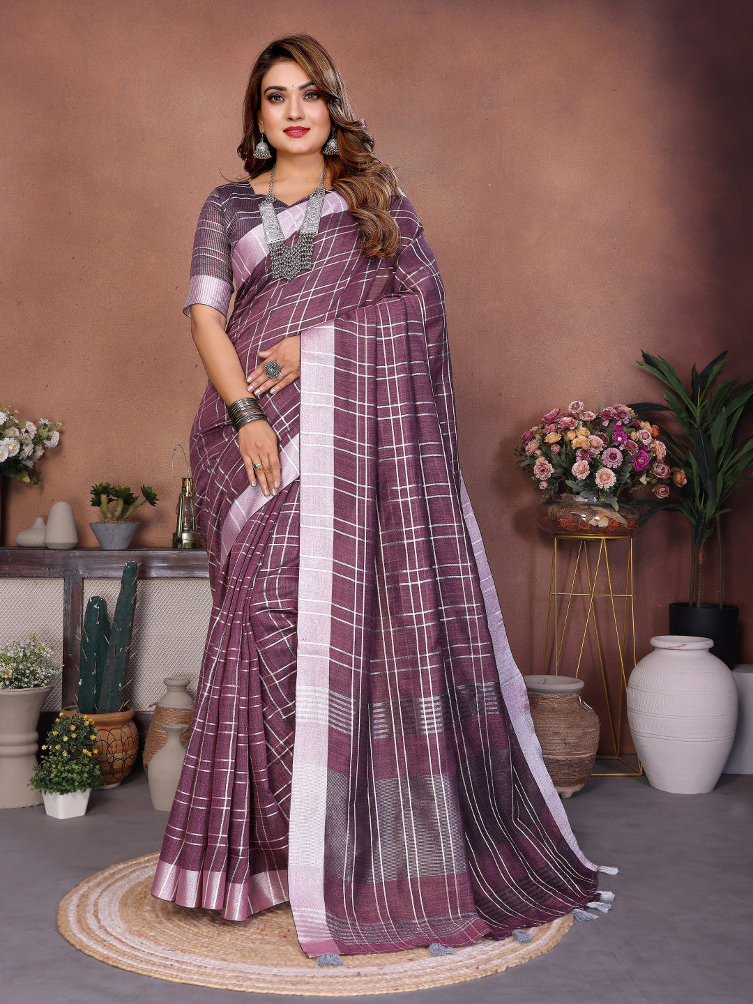 Magenta linen cotton saree with silver zari border