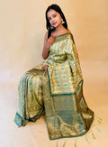 Pista green banarasi silk saree with patola weave - Classic to Modern